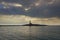 Apulia coast: Vieste Lighthouse dominated by clouds. Italy.