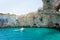 Apulia, Grotta Zinzulusa - A motorboat at the famous grotto of Z