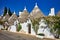 Apulia Puglia Italy. Alberobello. Trulli: traditional Apulian dry stone huts with a conical roof