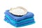 Aqua and blue towels with scallop shell on top