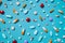 Aqua pills and capsules with a Sky blue background and Electric blue pattern