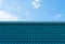 Aqua tile roofing with blue sky