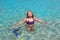 Aqua water beach and open arms bikini little girl