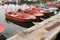 aquaculture boats on pier and some digging tools