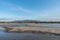 Aquaculture farms and saline alkali land by the sea under the blue sky