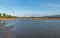 Aquaculture farms and saline alkali land by the sea under the blue sky