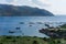 Aquaculture settlement, fish farm with floating circle cages around bay of Attica in Greece