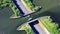 Aquaduct Veluwemeer, Nederland. Aerial view from the drone. A sailboat sails through the aqueduct on the lake above the