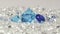 A aquamarine blue diamonds arranged in the middle of white diamonds