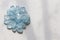 Aquamarine stone. Natural stone and aquamarine crystals on a white background. Beautiful aquamarine stones. Copy space for your