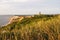 Aquinnah Lighthouse and cliffs at sunset