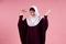 Arab attractive woman in hijab lets things go