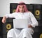 Arab businessman trading crude oil on laptop