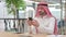 Arab Businessman using Smartphone, Text Messaging