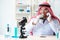 The arab chemist scientist testing quality of oil petrol