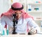 Arab chemist scientist testing quality of oil petrol