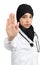 Arab female doctor making a hand stop gesture