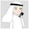 Arab guy holds mobile phone and smiles