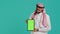 Arab guy presents greenscreen display