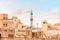 Arab houses and the towering minaret of the mosque in the neighborhood of Bur Dubai Creek and Golden Souk