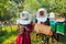 Arab investors checking the quality of honey on a large honey farm in which they invested their money. The concept of