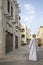 Arab Man admiring architecture of Al Seef