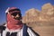 Arab Man In Turban And Sunglasses In Desert