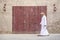 Arab Man walking in Al Seef are of Dubai