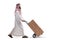 Arab man walking and pushing a hand-truck with a pile of cardboard boxes