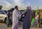 Arab men chatting at rural market