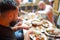 Arab men in restaurant enjoying Middle Eastern food