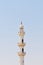 Arab minaret on a sunny and cloudless day