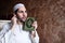 Arab muslim man with Koran islamic holy book and headset