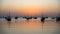 Arab traditional dhows in the shore during the sunrise in Qatar