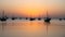 Arab traditional dhows in the shore during the sunrise in Qatar