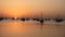 Arab traditional dhows in the shore during the sunrise in Qatar