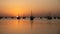 Arab traditional dhows in the shore during the sunrise in Qatar