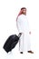 Arab traveler saudi man carrying a suitcase