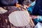 Arab woman makes bread in the beduin village in Egypt