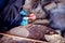 Arab woman makes bread in the beduin village in Egypt