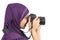 Arab woman photographer holding a dslr camera