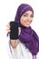 Arab woman wearing a hijab showing a blank smartphone screen