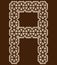 Arabesque style decorative letter.Brown cracked font.