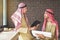 Arabian Business Advisory meeting two people talking business wi
