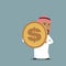 Arabian businessman carrying a golden dollar coin