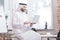 Arabian businessman typing on laptop