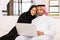 Arabian couple laptop home