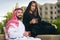 Arabian couple relaxing & drinking tea