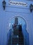 Arabian entrance gate in african Chefchaouen town in Morocc - vertical