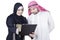 Arabian female worker and partner look at clipboard